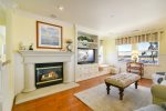 Living Room Fireplace and Big Screen TV with DVD